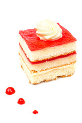 Strawberry cake with soft shadow on white dish. Shallow DOF
