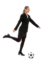 young businesswoman with a soccer ball on white background