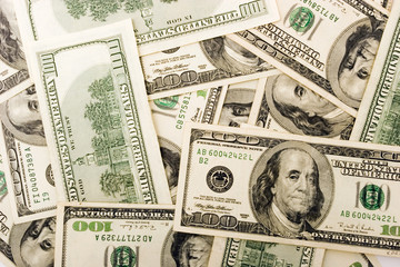 Bunch of hundred dollar bills background