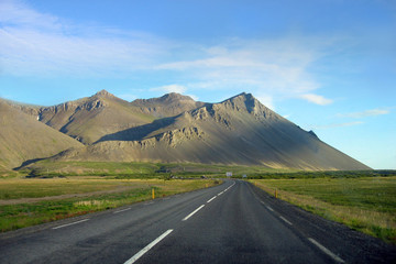 Volcanic mountains and road