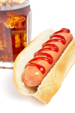 hot dog and soda with shadow on white background. Shallow DOF