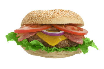 Cheeseburger with bacon, lettuce and onion on sesame seed bun
