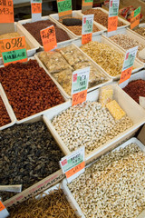 dried fish, nuts, fruit, seeds, and mushrooms at market