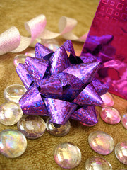 pink package and violet celebration bow