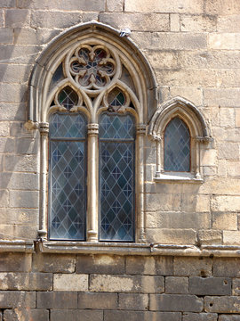 ancient window of a cathedral . Barcelona