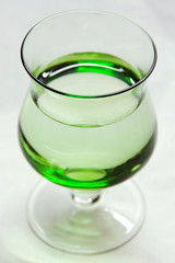 a photo of a green glass