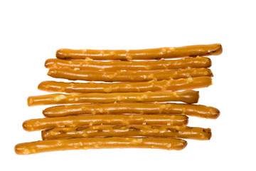 A small pile of salted pretzel sticks.