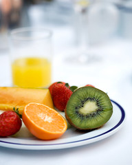 Delicious hotel breakfast with lot of fruits