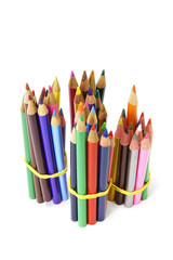 Bundles of Color Pencils on White Background