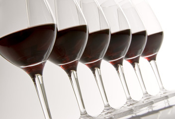 A Row of Glasses with Red Wine