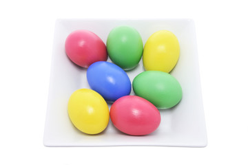 Easter Eggs in Square Bowl on White Background