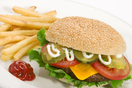Close up image of a hamburger and french fries