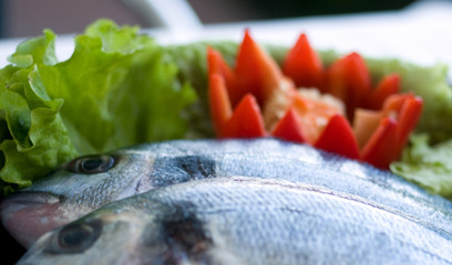 fresh cardinalfish with vegetables, ready to cook