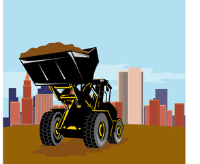 Front loader with buildings in the background