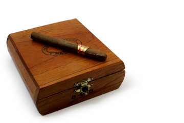 left last cigar on brown wooden box