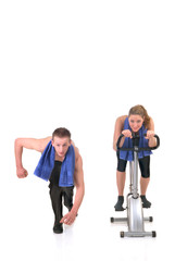 attractive female, handsome male doing fitness exercises 