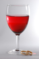 Red wine and wedding rings