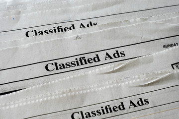 Classified Ads section of newspaper  