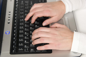 typing on a computer keyboard