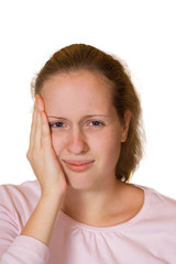 Girl with a toothache, isolated on white background