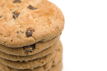 Stack of homemade chocolate chip cookies. Isolated on white.