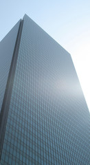 A blue corporate building in the blue sky