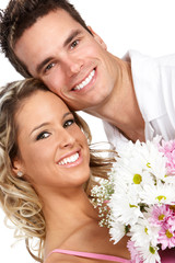 Young love couple smiling. Over white background  .