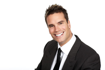 Young smiling businessman. Isolated over white background.