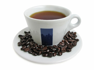 White coffee cup with coffee beans