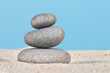 Fototapeta na wymiar Pebble stack on the seahore in balance.