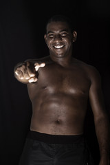 Fototapeta premium Portrait of young afromerican man with happy expression