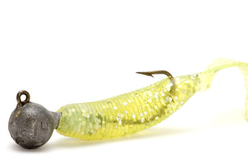 object on white spoon-bait with hook