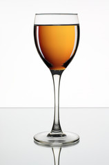 wineglass with wine on the white background