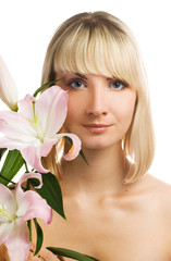 Beautiful girl with pink lily isolated on white background