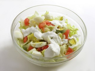 vegetable multicolor salad with cream