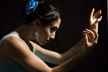 Passionate flamenco dancer girl isolated on black - obrazy, fototapety, plakaty