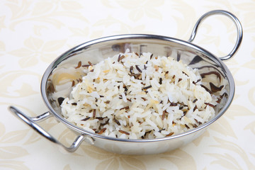 Portion of wild and long-grain rices