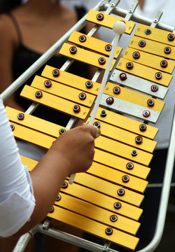 A xylophone being played during a parade
