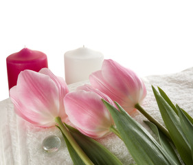 Obraz na płótnie Canvas Towels, tulips and candles