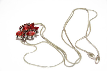 silver pendant with ruby on isolated background