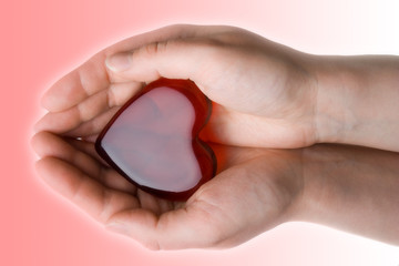 Heart symbol in woman's hands 3  