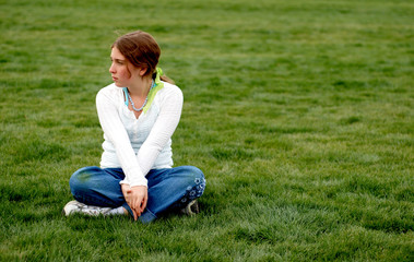 young and happy girl is enjoying herself outdoors