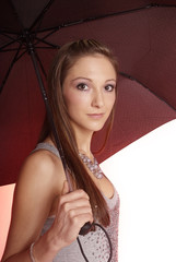 pretty woman with long brown hair and umbrella