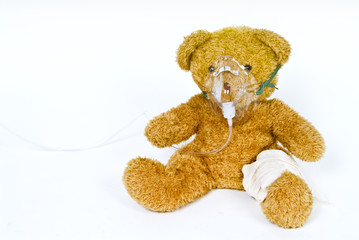 teddy bear with oxygen mask and bandege