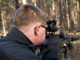 Man aiming the target
