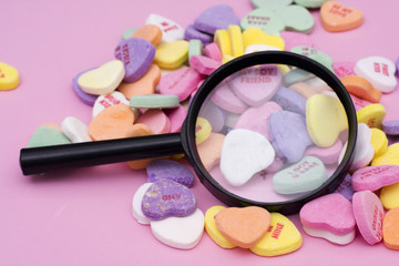 Magnifying glass with candy hearts