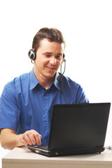 Man with a headset and notebook