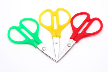 Red, green and yellow little scissors