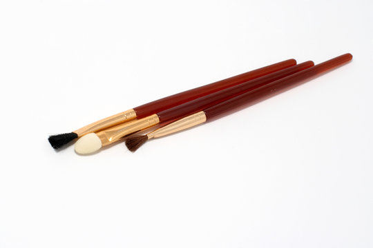 Aplicator and two brushes for make-up