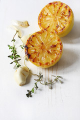 Obraz na płótnie Canvas Roasted lemon, garlic and thyme 
